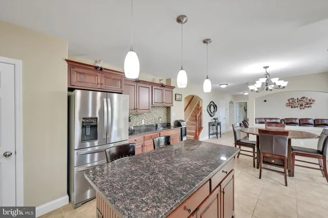 a utility room with sink dryer and washer
