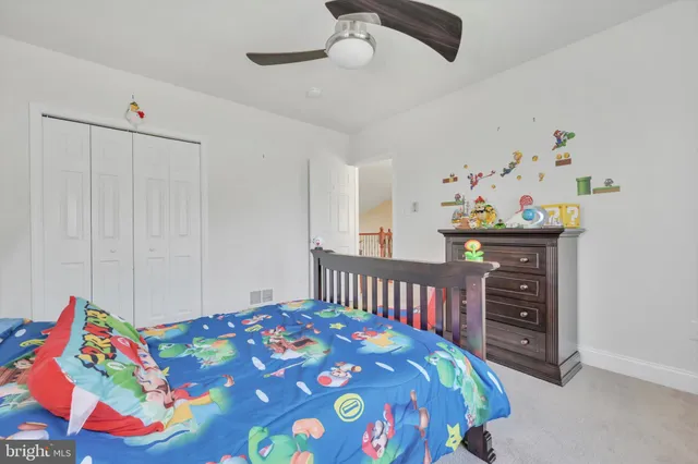 a bathroom with a sink a toilet and a shower