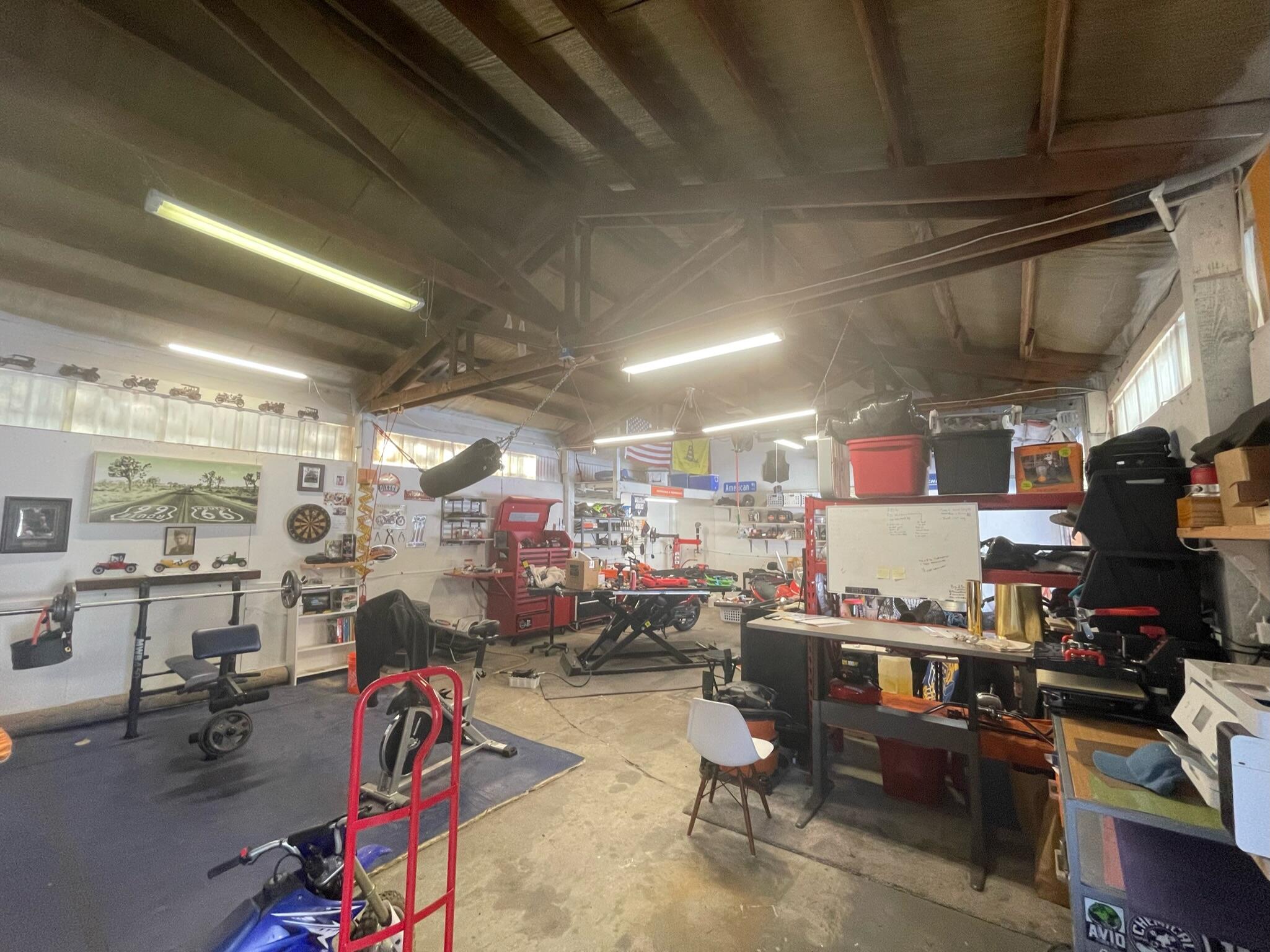 17317 Jacinto Road Bend, OR 97707 - Photo 21 of 25 a room with lots of furniture and clutter