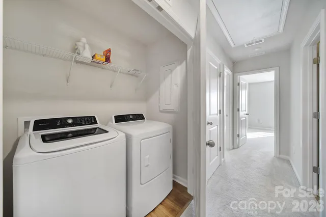 a utility room with dryer and washer