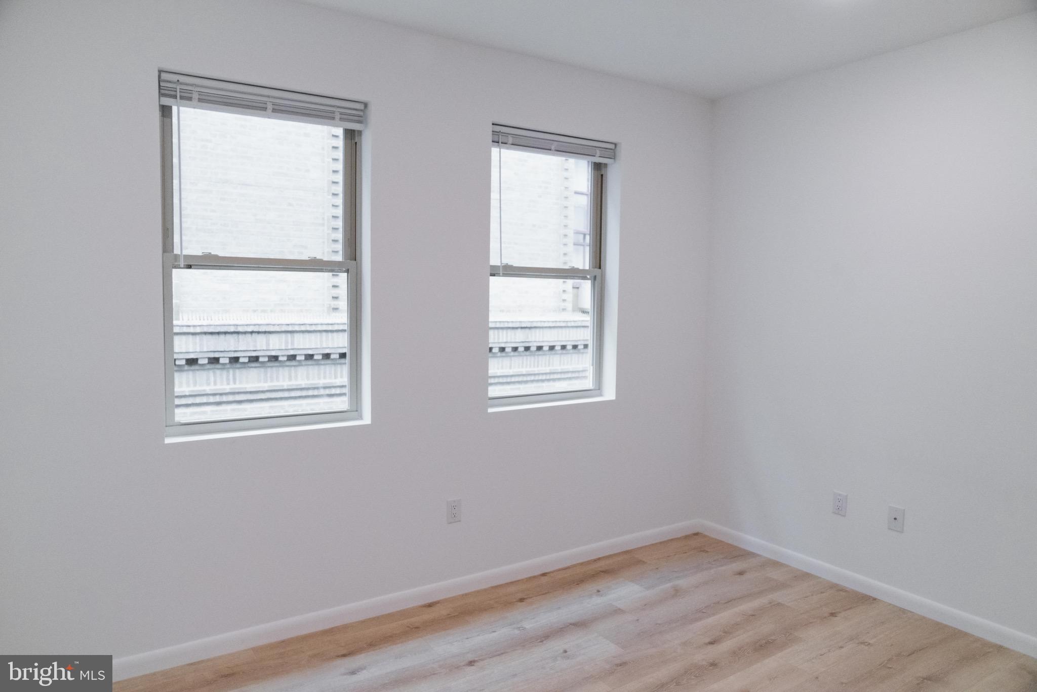 7248 Rising Sun Avenue, Unit 201 Philadelphia, PA 19111 - Photo 17 of 20 a view of an empty room with a window