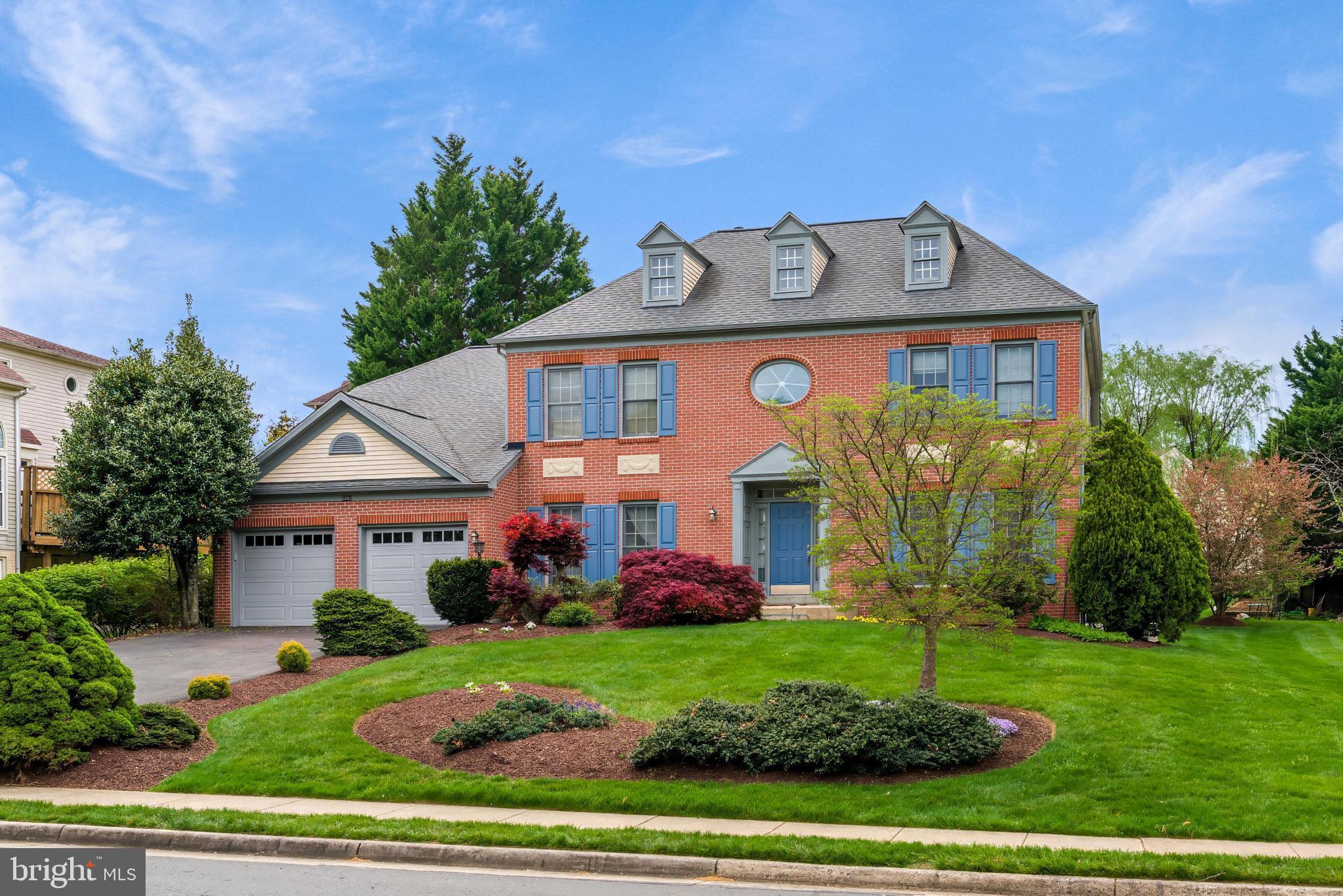5501 Ashleigh Road Fairfax, VA 22030 - Photo 2 of 77 a front view of a house with garden