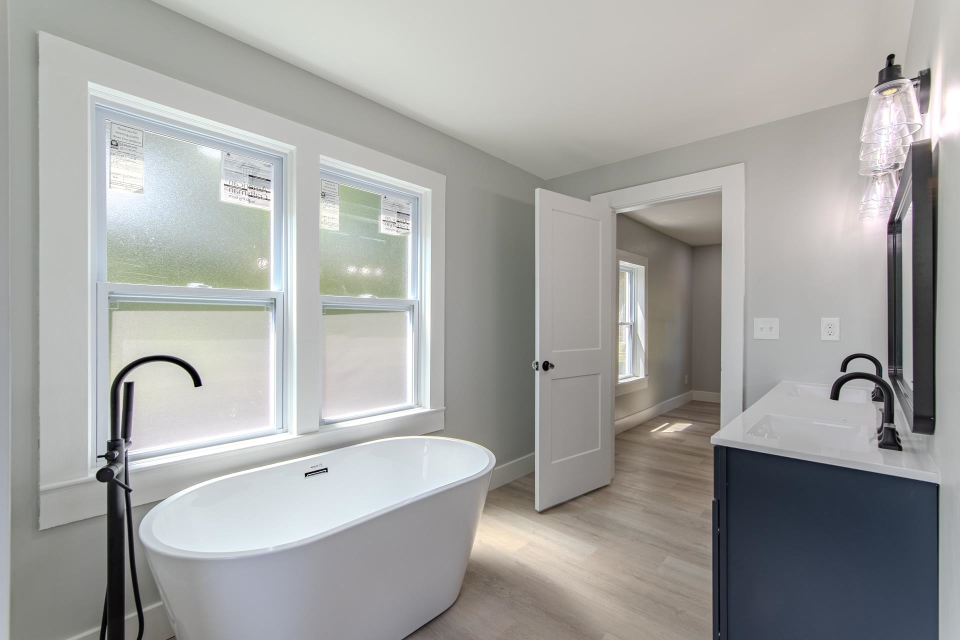 6800 Glendale Road Morris Chapel, TN 38361 - Photo 16 of 40 a bathroom with a tub and sink