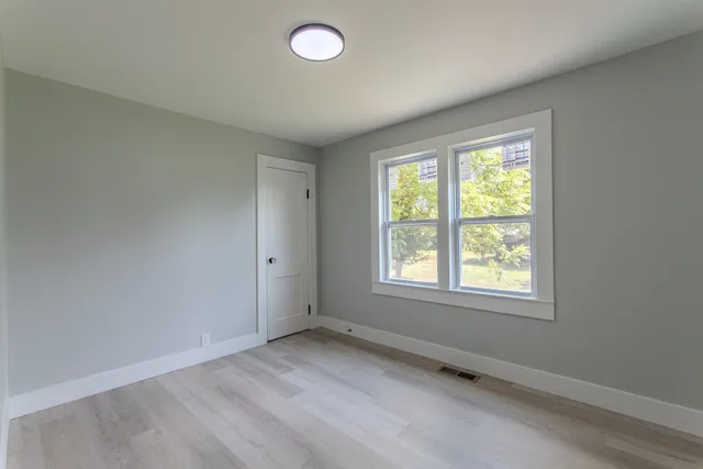 an empty room with a window