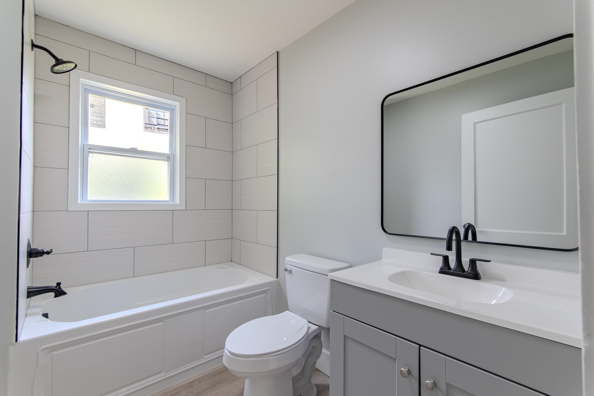6800 Glendale Road Morris Chapel, TN 38361 - Photo 20 of 40 a bathroom with a sink a toilet and shower