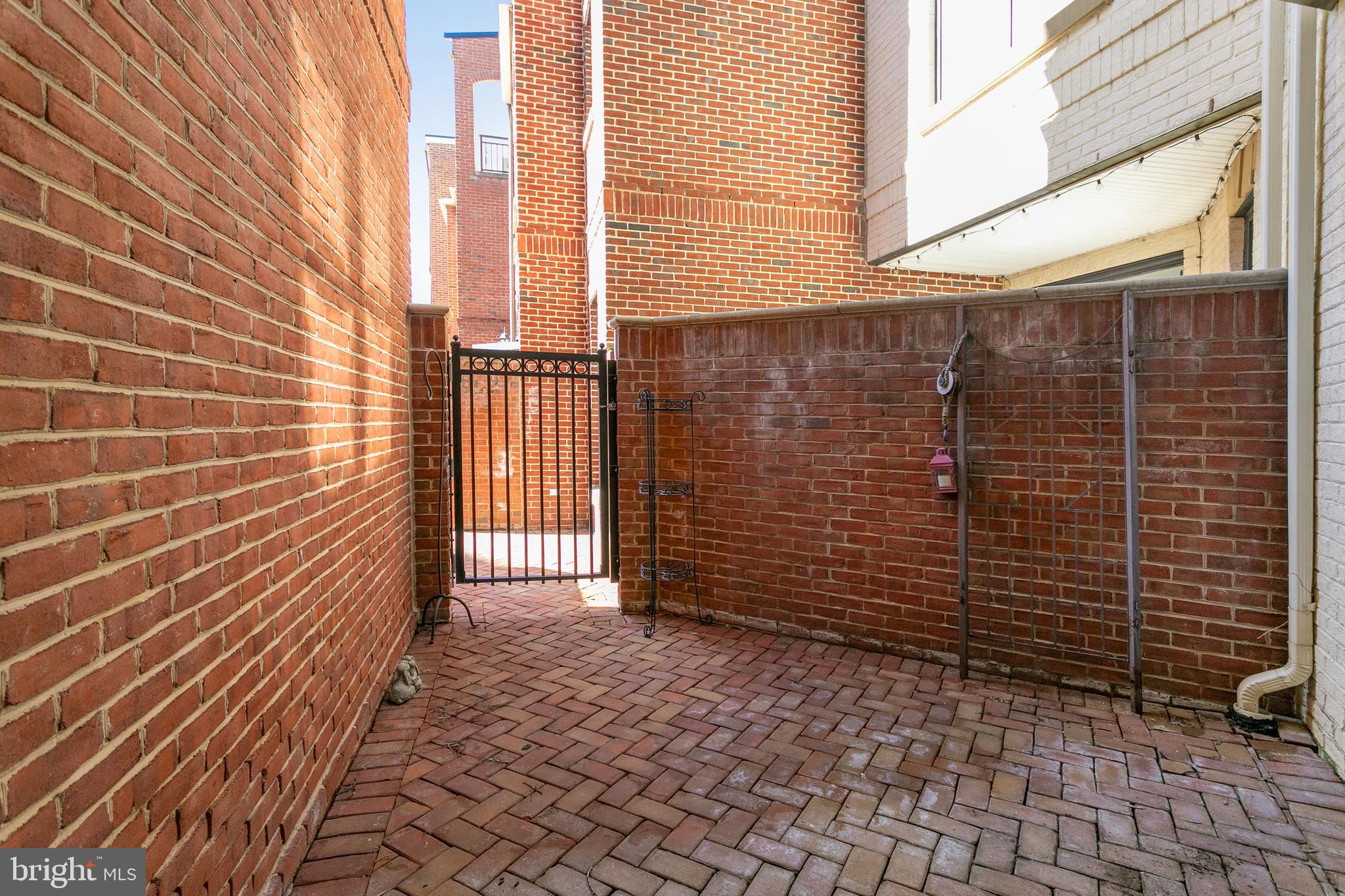1300 Duke Street Alexandria, VA 22314 - Photo 10 of 36 Private patio off LR - leads to courtyard/trash