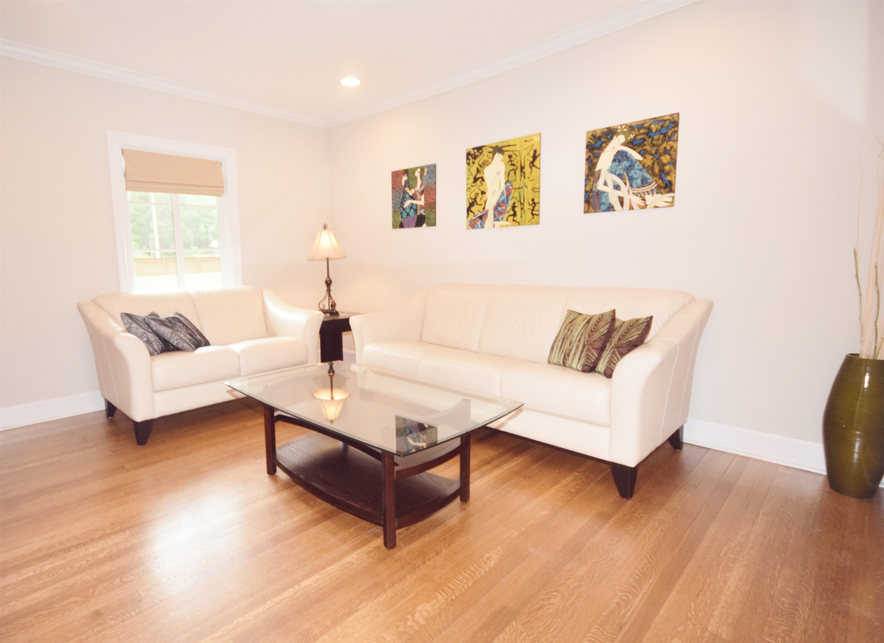 181 South Mendenhall Road Memphis, TN 38117 - Photo 9 of 25 a living room with furniture and a wooden floor
