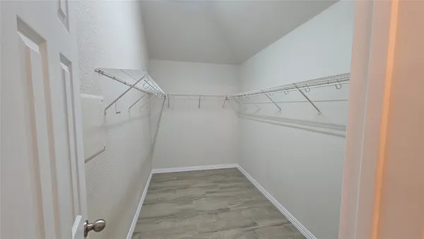 a view of a walk in closet