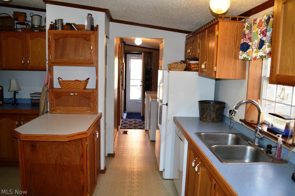 940 Bells Run Road Newport, OH 45768 - Photo 10 of 23 Kitchen to Side Entry and Laundry Room