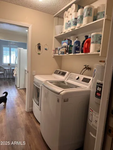 a utility room with dryer and washer