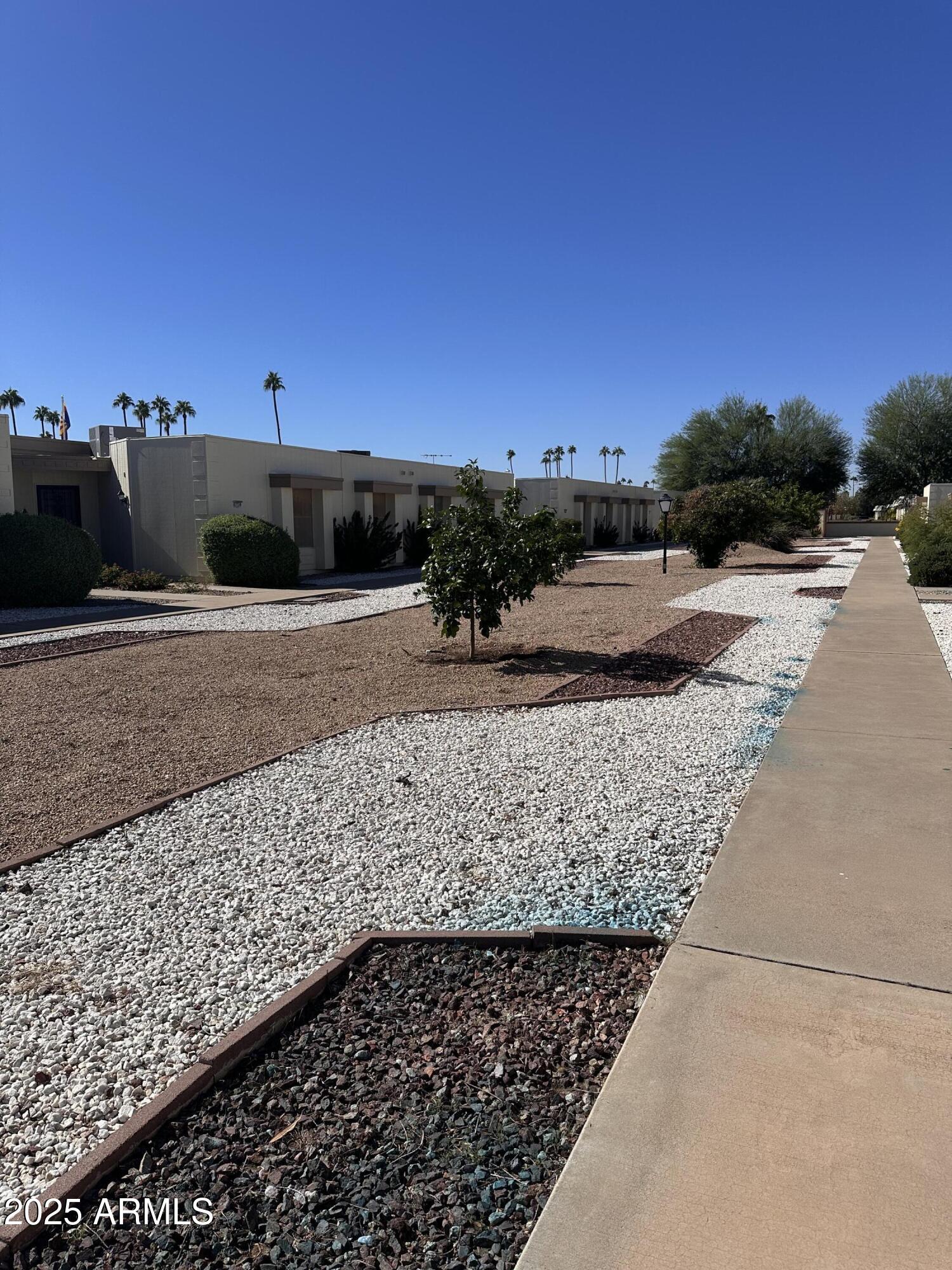 17247 North 106th Avenue Sun City, AZ 85373 - Photo 29 of 30 a view of a road with an ocean view
