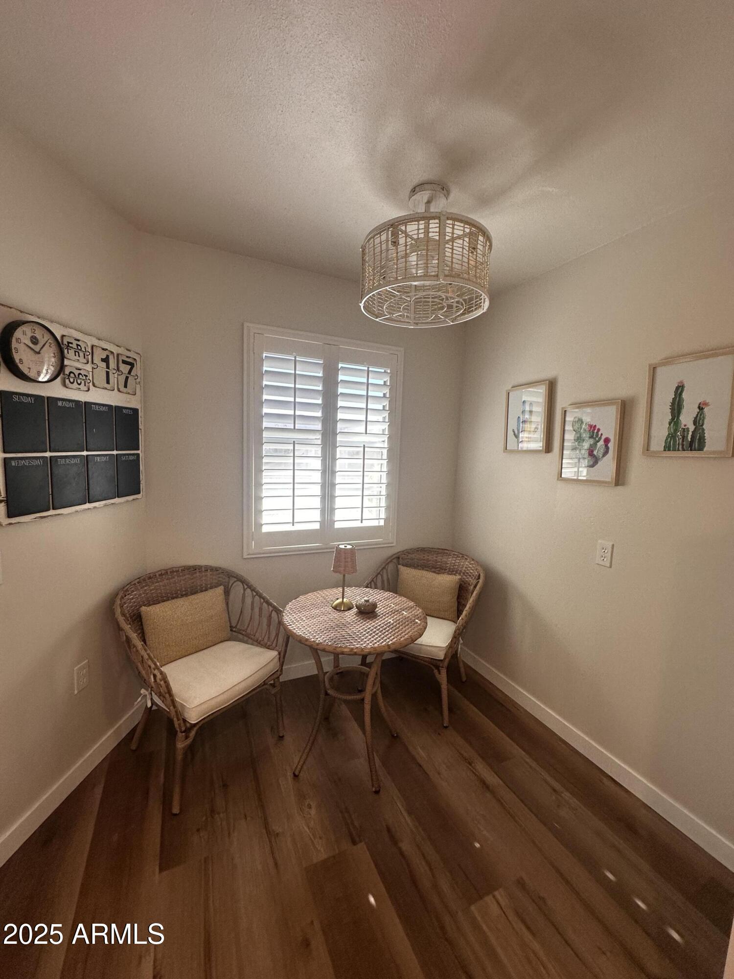 17247 North 106th Avenue Sun City, AZ 85373 - Photo 10 of 30 a dining room with furniture and window