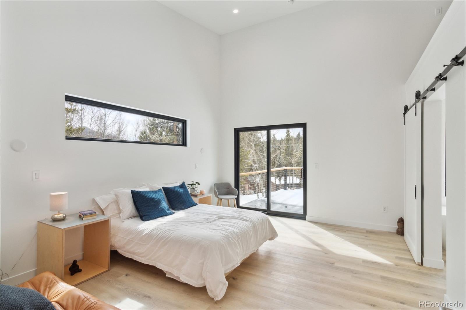 118 Quartz Road Black Hawk, CO 80422 - Photo 13 of 35 a bedroom with a bed and window