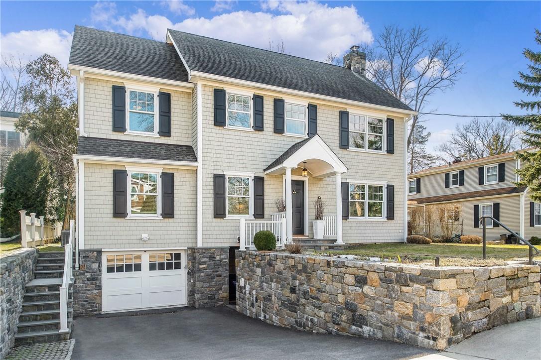 308 Rye Beach Avenue Rye, NY 10580 - Photo 1 of 1 a front view of a house with a yard