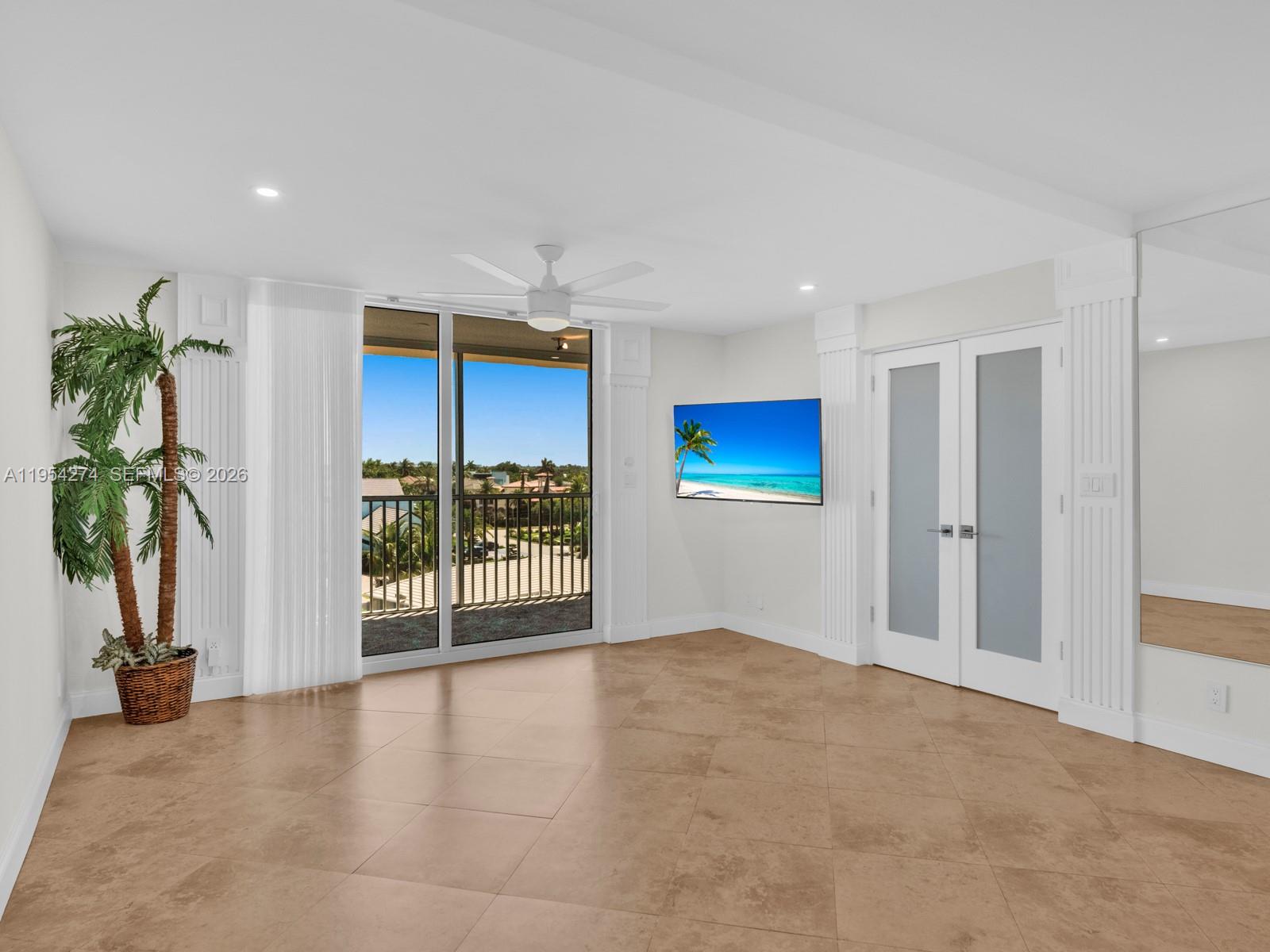 750 Northeast Spanish River Boulevard, Unit 5050 Boca Raton, FL 33431 - Photo 11 of 41 a view of a living room and hallway