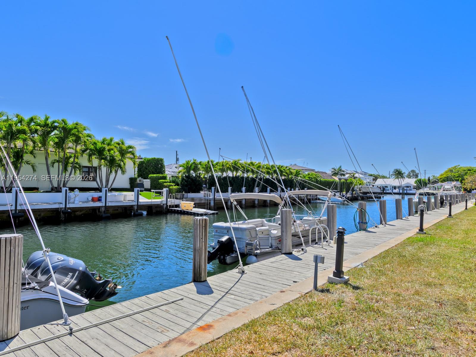 750 Northeast Spanish River Boulevard, Unit 5050 Boca Raton, FL 33431 - Photo 35 of 41 a view of a lake with a patio