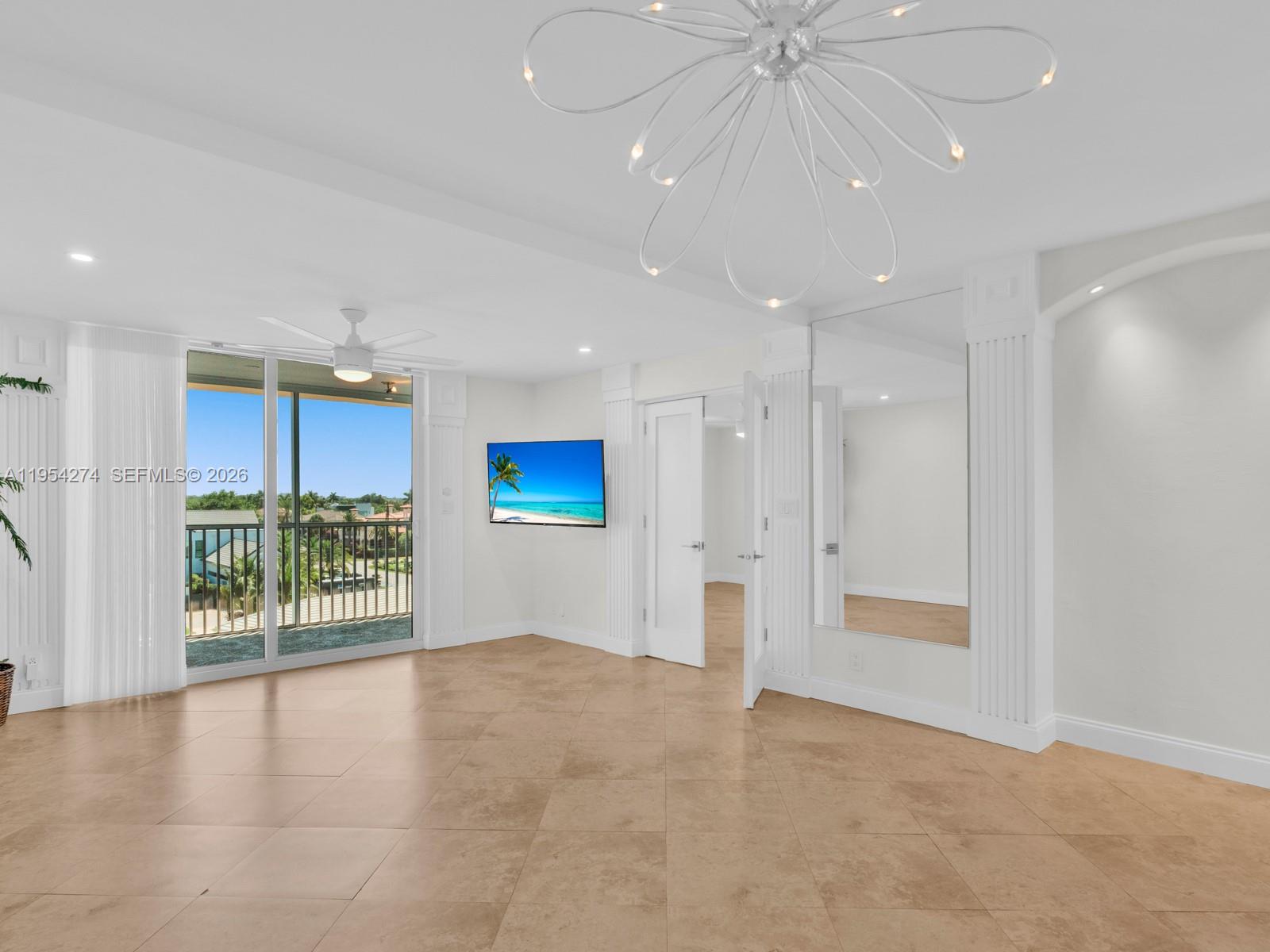 750 Northeast Spanish River Boulevard, Unit 5050 Boca Raton, FL 33431 - Photo 10 of 41 a view of an empty room with a window