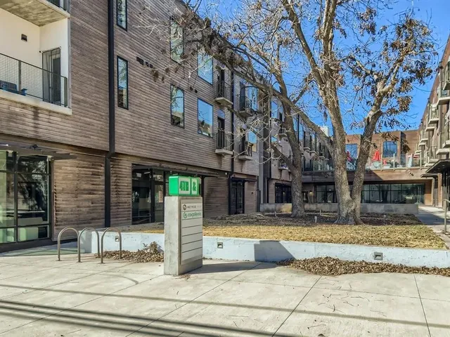 a view of a building with a street