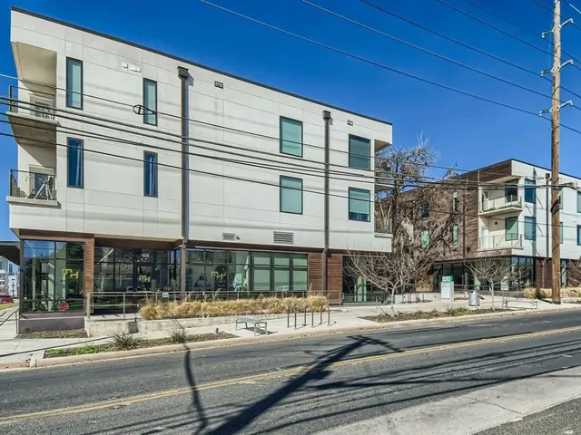 a view of a building and a street