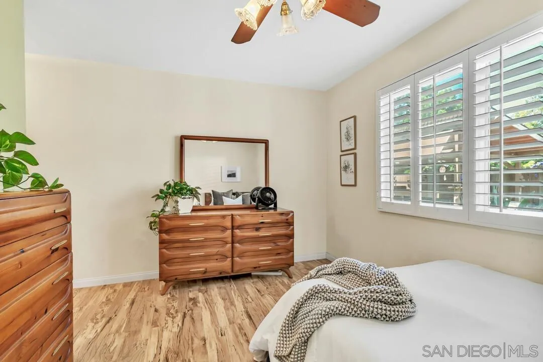14228 Frame Road Poway, CA 92064 - Photo 15 of 49 a bedroom with a bed and a window