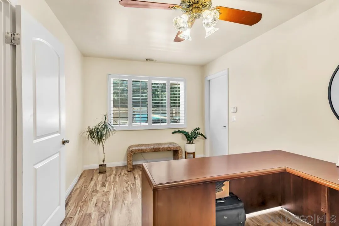 14228 Frame Road Poway, CA 92064 - Photo 20 of 49 a room with a table and chairs