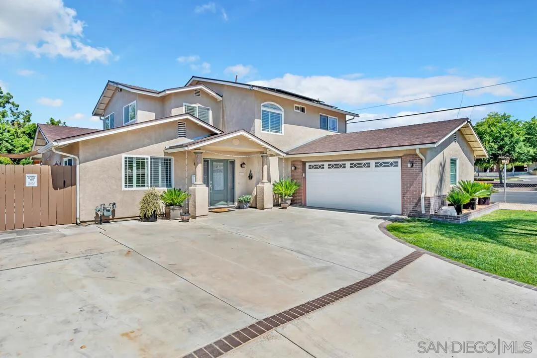 14228 Frame Road Poway, CA 92064 - Photo 2 of 49 front view of a house with a yard