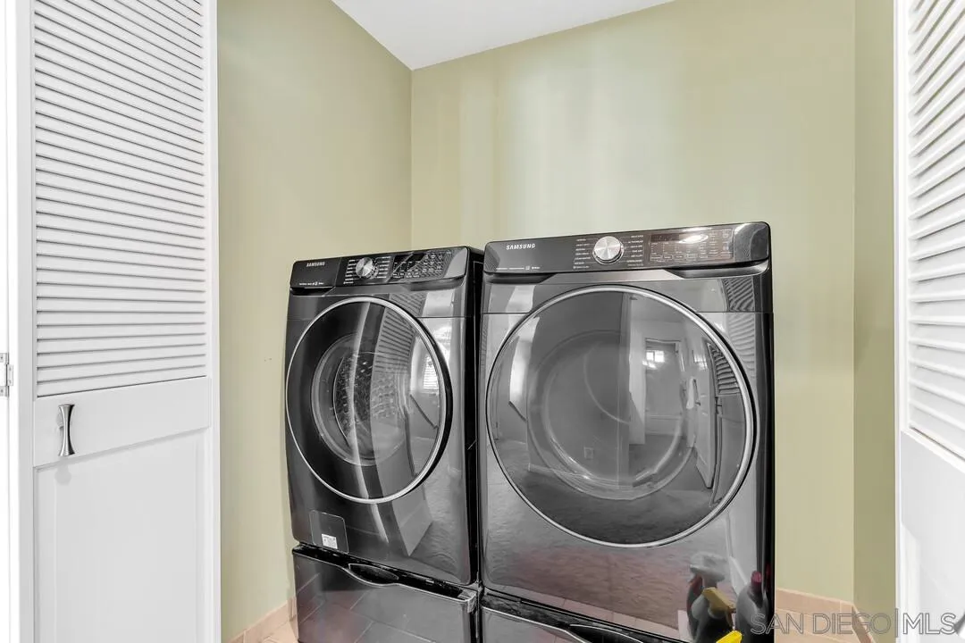 14228 Frame Road Poway, CA 92064 - Photo 32 of 49 a utility room with dryer and washer