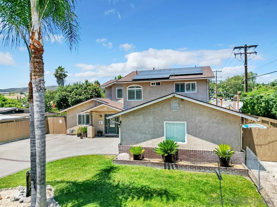14228 Frame Road Poway, CA 92064 - Photo 33 of 49 a front view of a house with garden