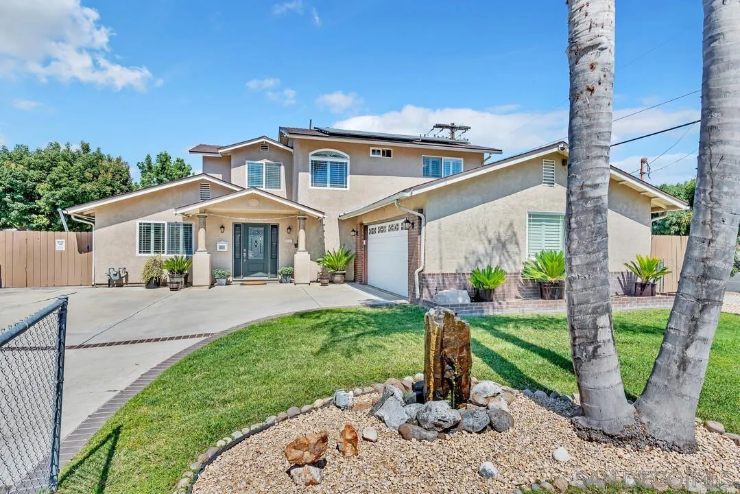 14228 Frame Road Poway, CA 92064 - Photo 34 of 49 a front view of a house with garden