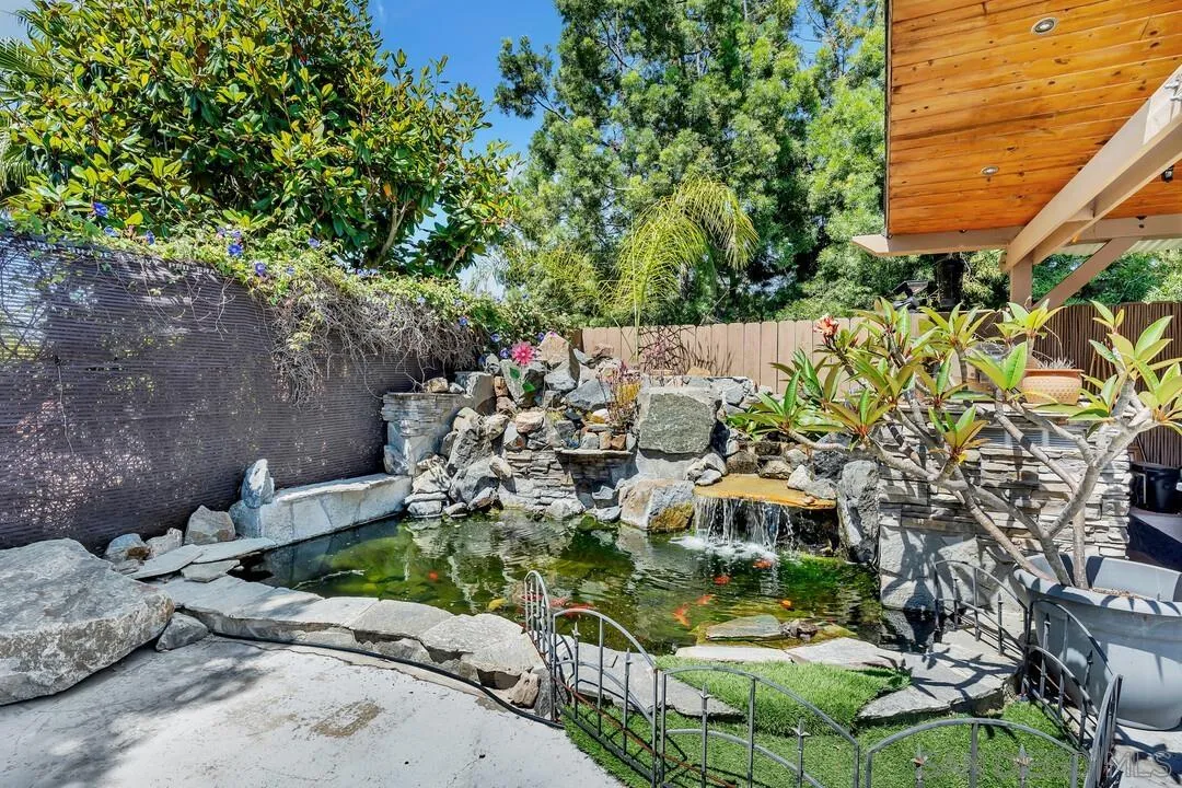 14228 Frame Road Poway, CA 92064 - Photo 42 of 49 a garden with lots of trees and flowers