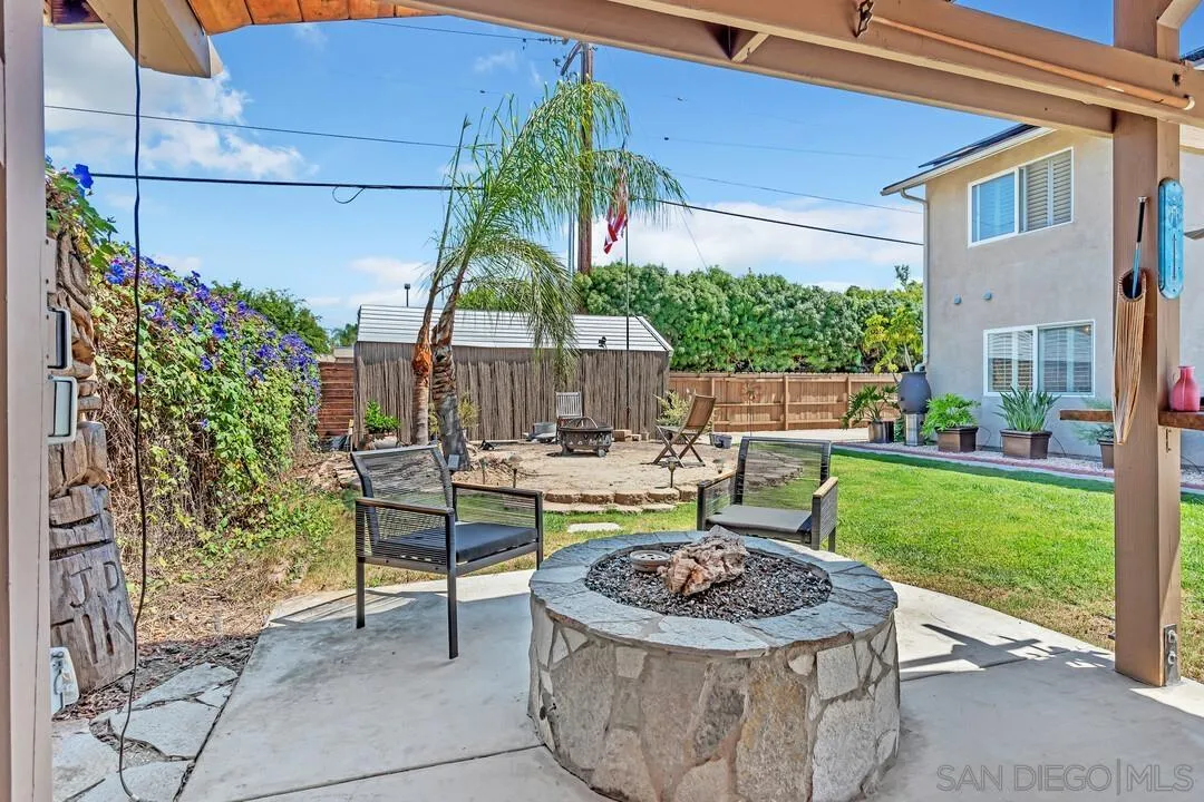 14228 Frame Road Poway, CA 92064 - Photo 44 of 49 a view of a backyard with plants and outdoor seating