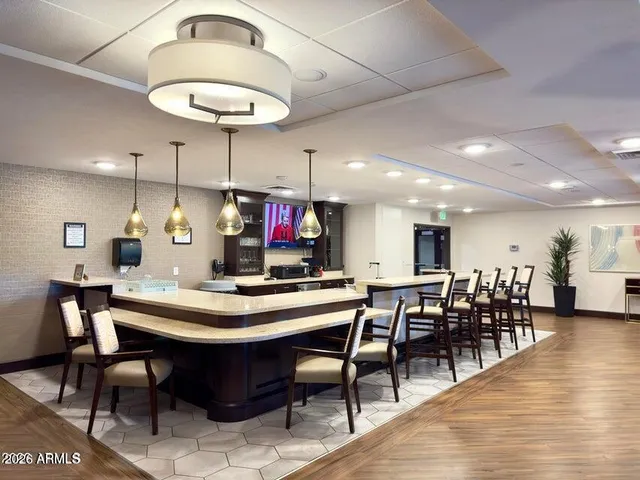 a view of a dining room with furniture