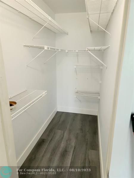 211 Mansfield East, Unit 211 Boca Raton, FL 33434 - Photo 8 of 14 a view of an empty walk in closet