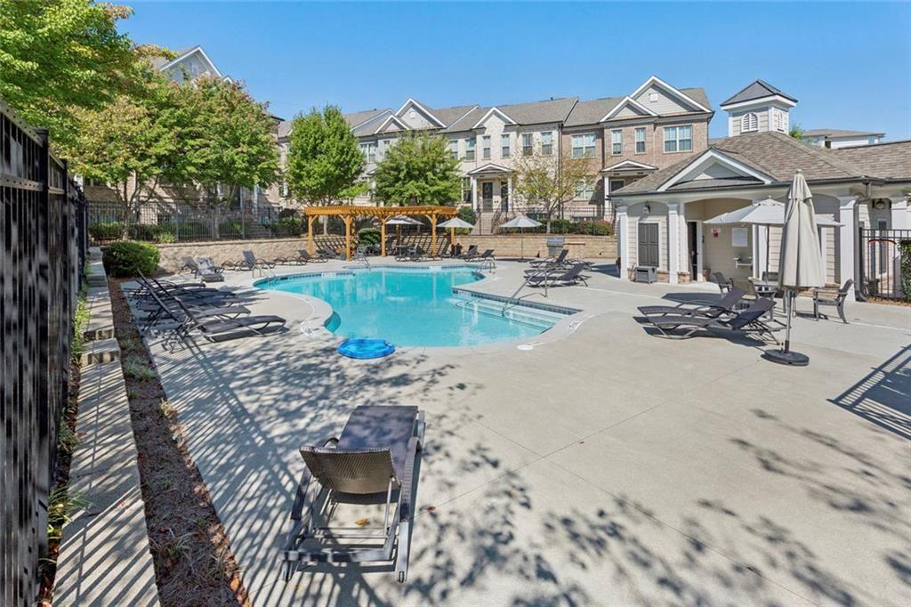 4219 Deming Circle Sandy Springs, GA 30342 - Photo 43 of 43 a view of a house with a swimming pool