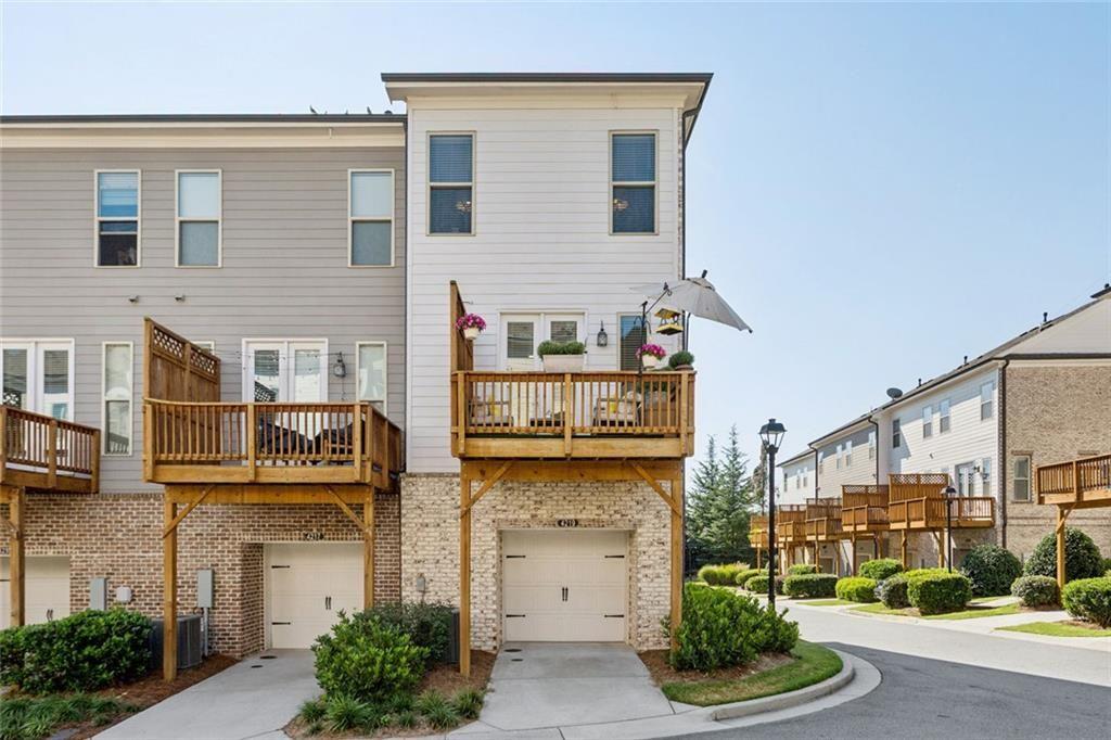 4219 Deming Circle Sandy Springs, GA 30342 - Photo 5 of 43 a front view of a house with a yard