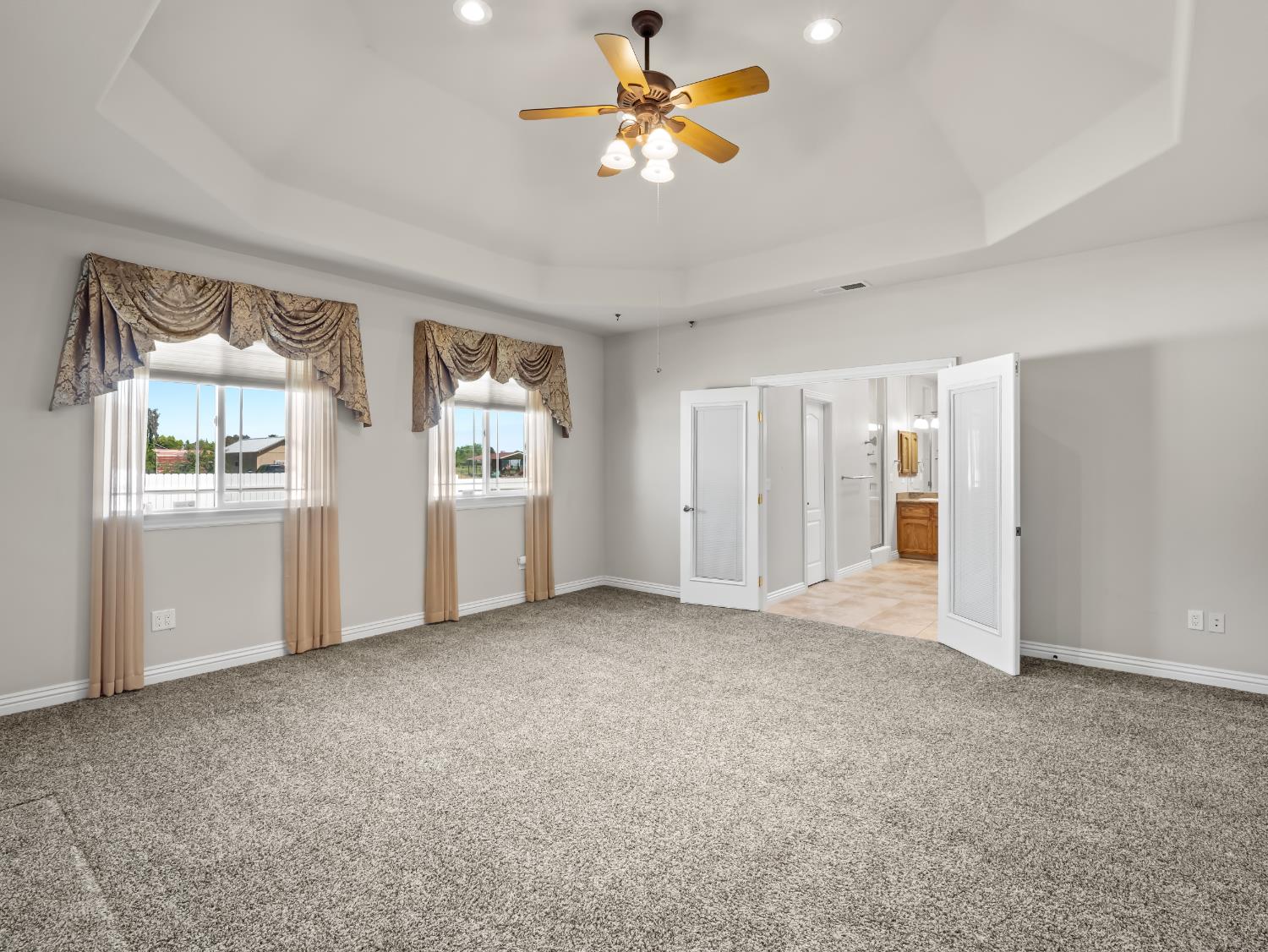 16389 Monreal Road Madera, CA 93636 - Photo 18 of 52 a view of an empty room with a window