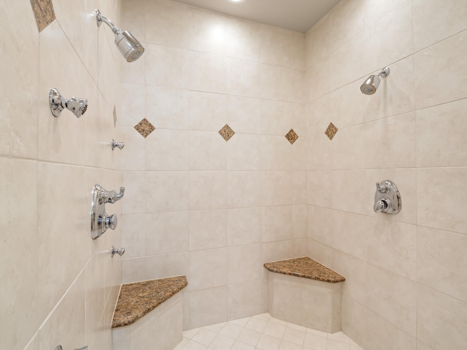 16389 Monreal Road Madera, CA 93636 - Photo 22 of 52 a bathroom with a toilet and shower