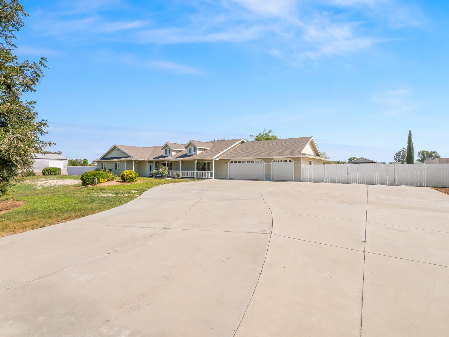 16389 Monreal Road Madera, CA 93636 - Photo 3 of 52 a house view with a outdoor space