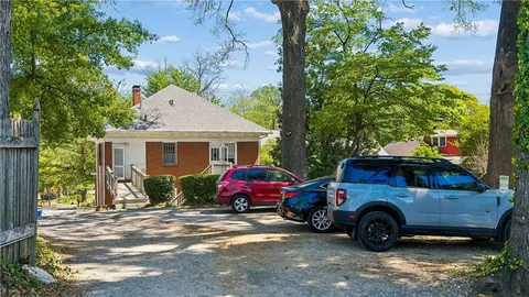 a view of a car in front of a house