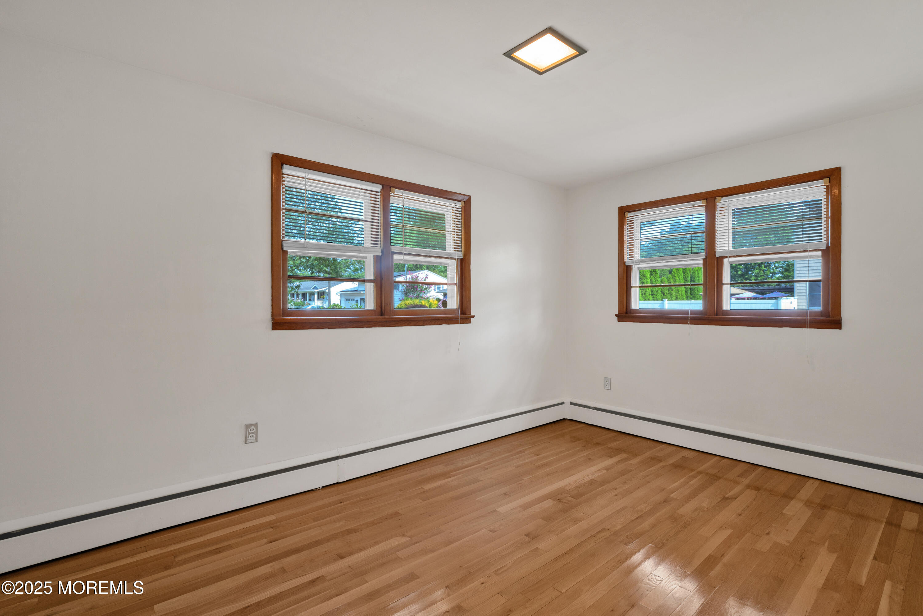 1215 Dorsett Dock Road Point Pleasant, NJ 08742 - Photo 13 of 16 an empty room with a window