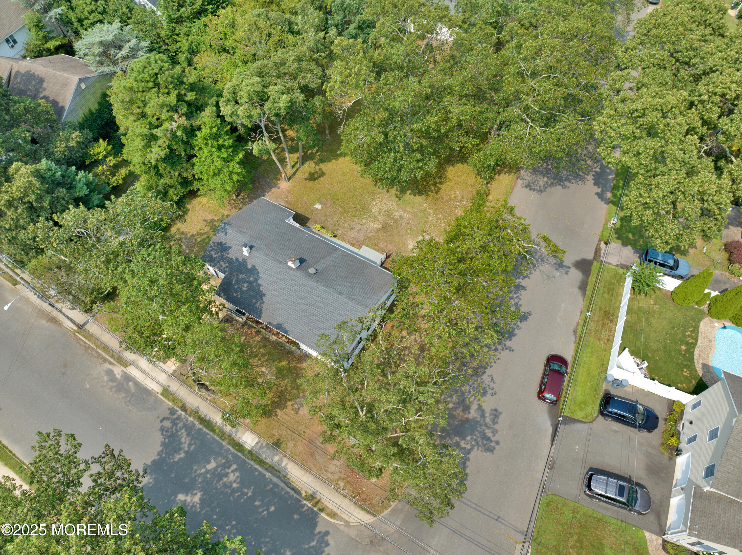1215 Dorsett Dock Road Point Pleasant, NJ 08742 - Photo 2 of 16 an aerial view of a house with a yard