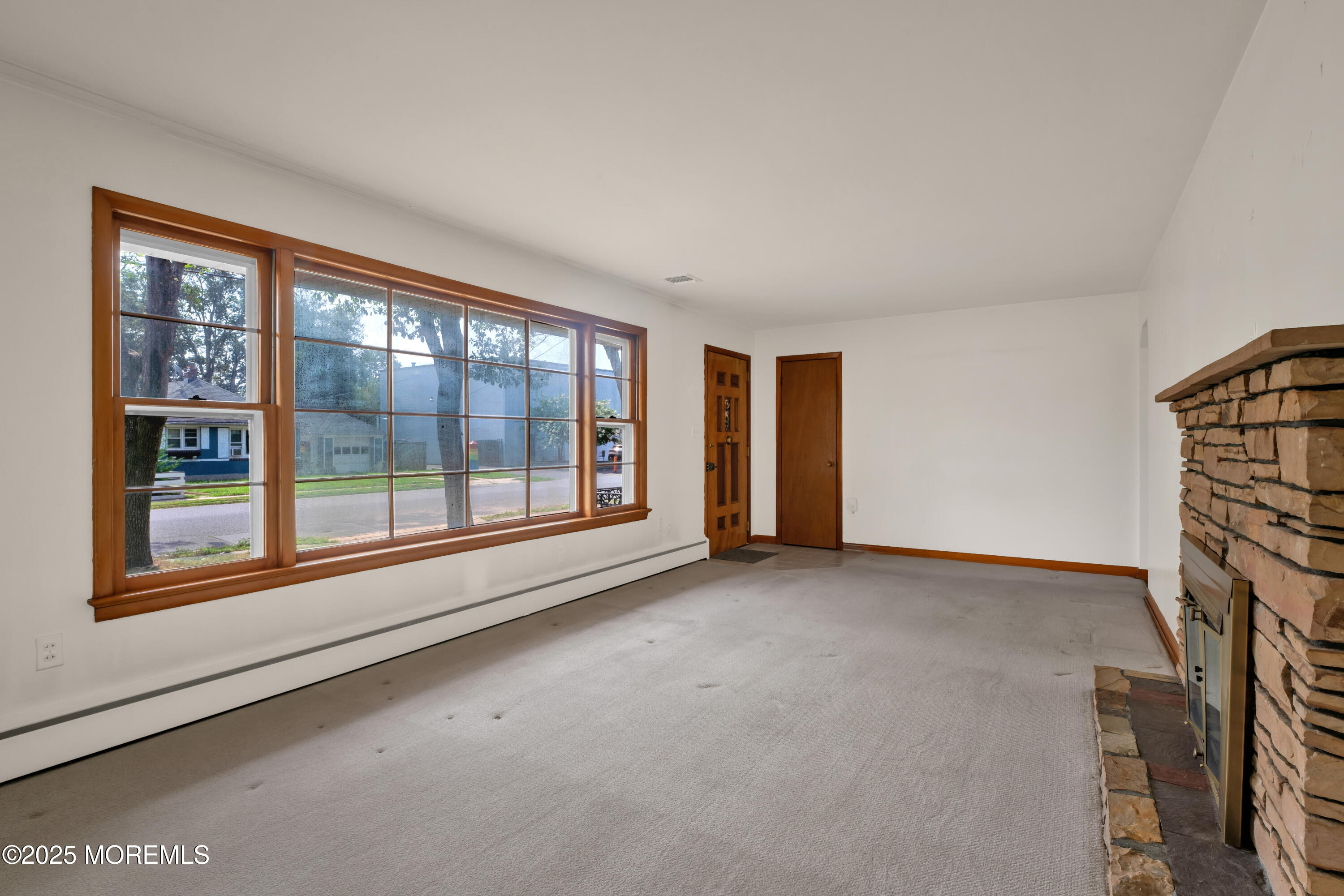 1215 Dorsett Dock Road Point Pleasant, NJ 08742 - Photo 6 of 16 a view of an empty room with a window