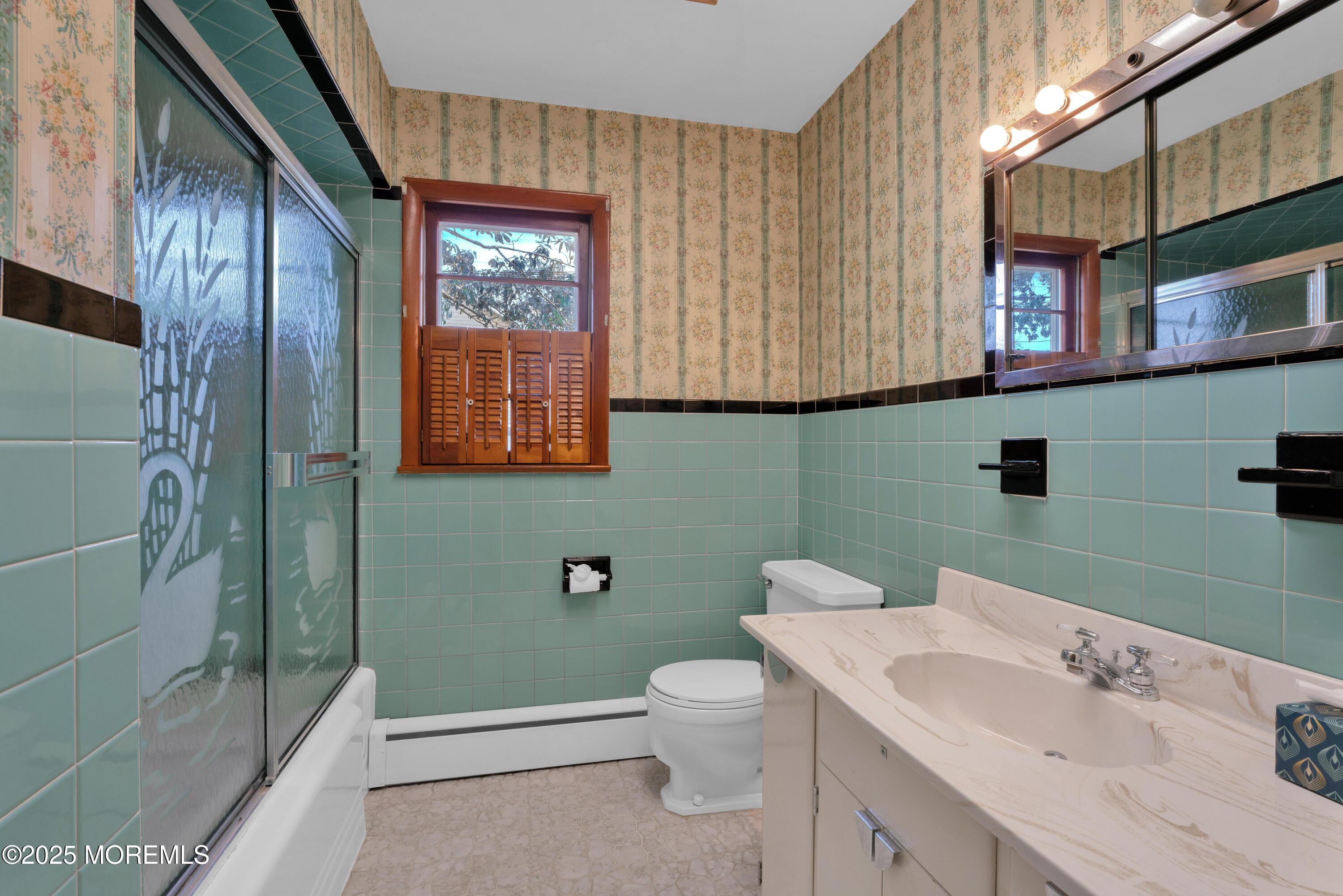 1215 Dorsett Dock Road Point Pleasant, NJ 08742 - Photo 9 of 16 a bathroom with a toilet sink and mirror