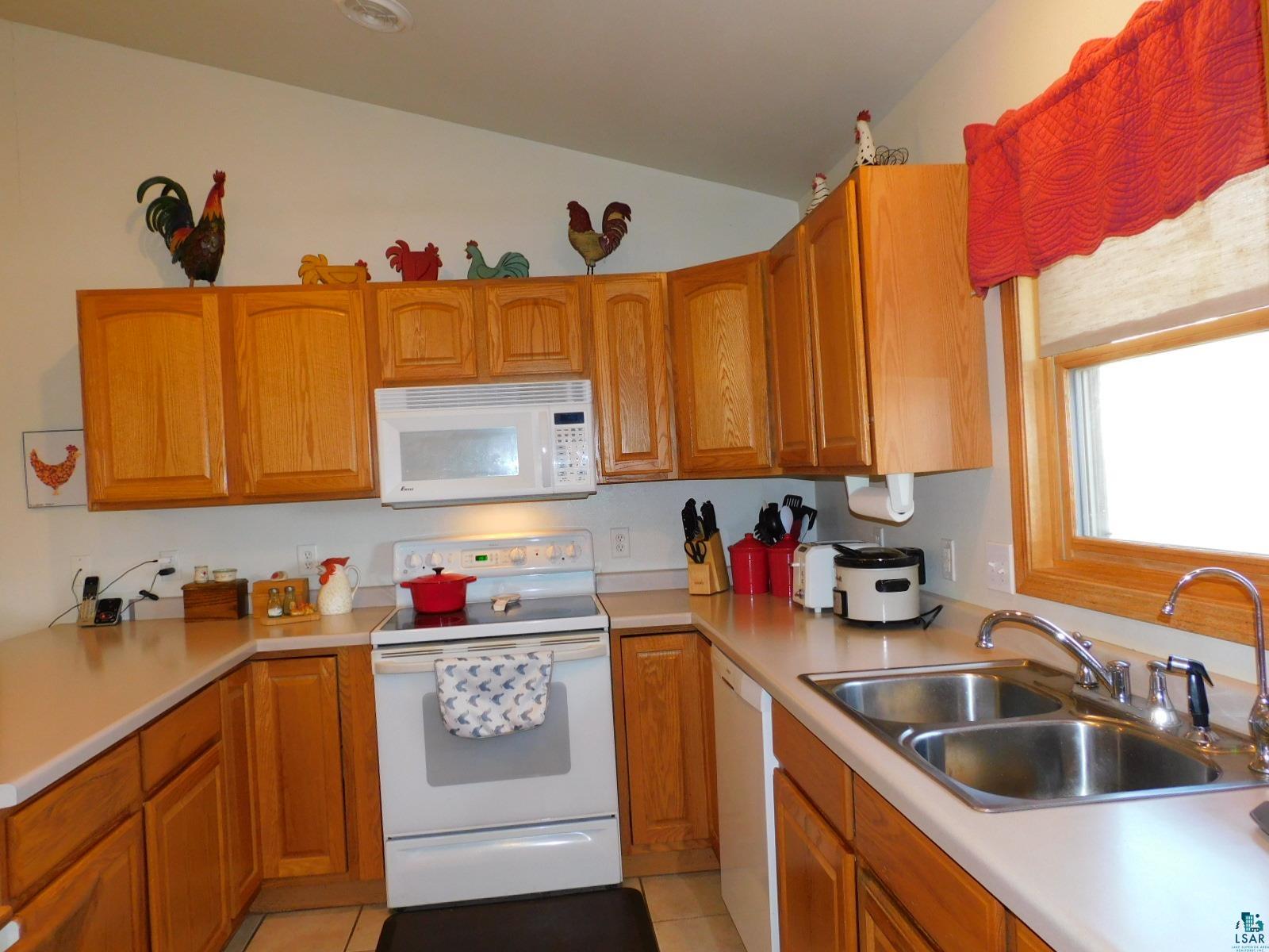 11615 East County Rd B Lake Nebagamon, WI 54849 - Photo 9 of 46 Kitchen with oak cabinets