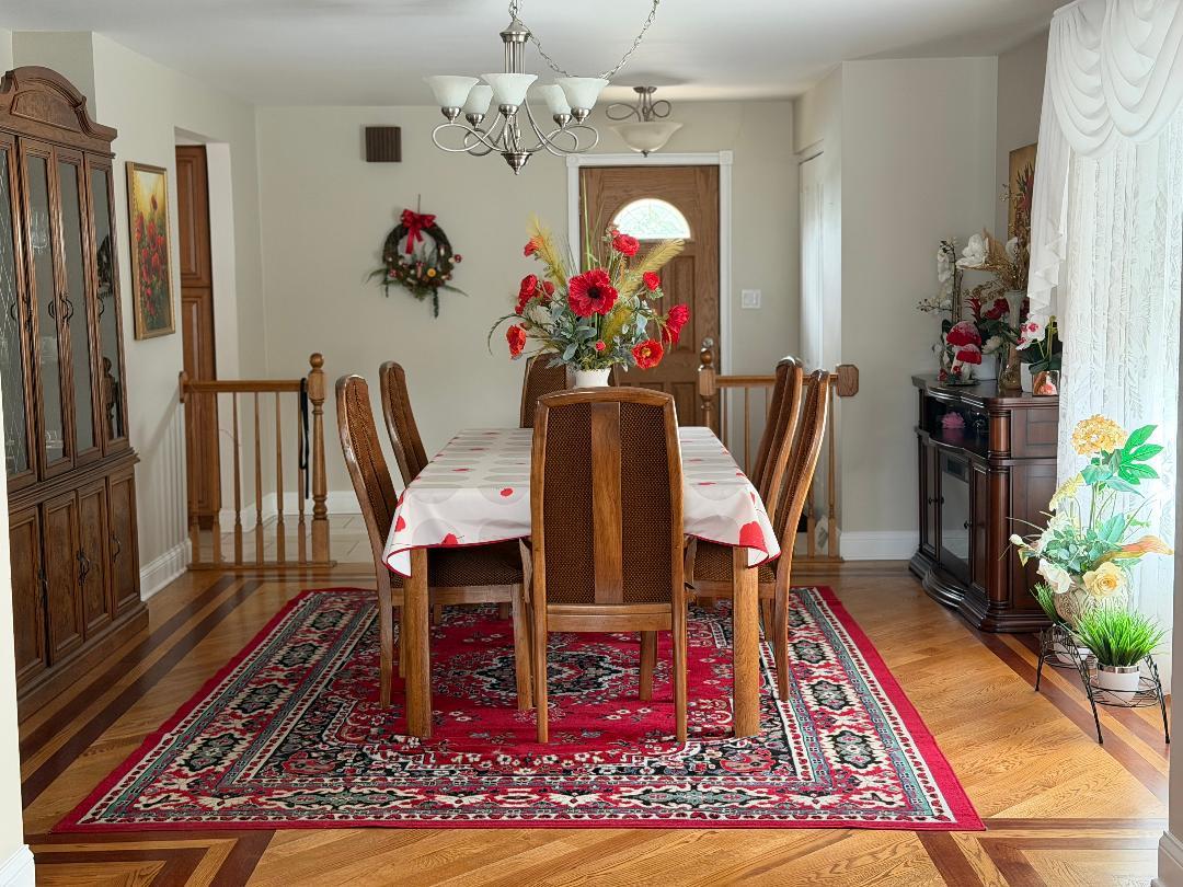 272 West Irving Park Road Wood Dale, IL 60191 - Photo 8 of 12 a view of a dining room with furniture and wooden floor