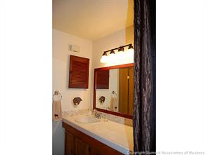 1937 Soda Ridge Road, Unit 1140 Keystone, CO 80435 - Photo 12 of 20 a bathroom with a sink and a mirror