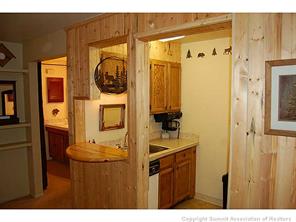 1937 Soda Ridge Road, Unit 1140 Keystone, CO 80435 - Photo 3 of 20 a bathroom with a sink a mirror and shower