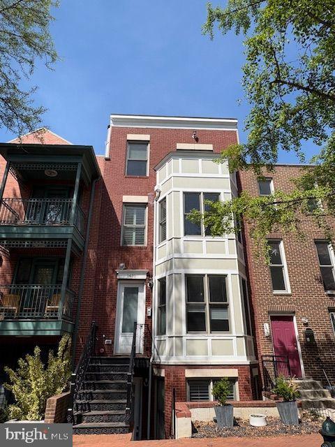 a front view of a multi story building