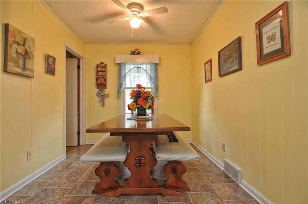 198 Yountz Road Lexington, NC 27292 - Photo 9 of 30 Dining room, adjacent to kitchen. Door to left is laundry room.