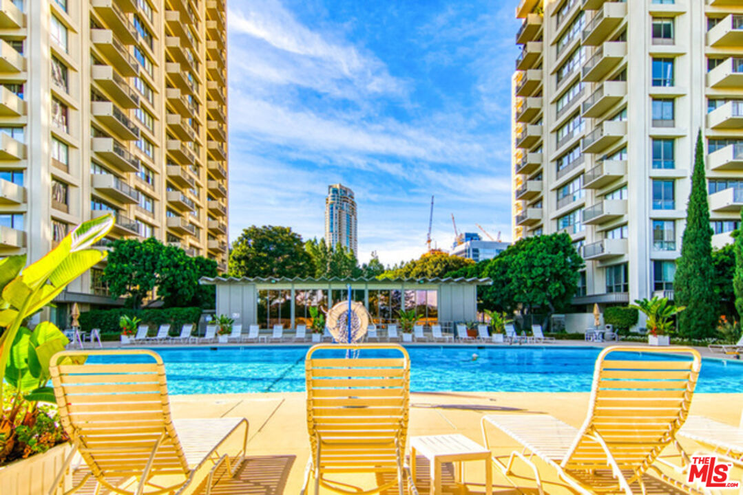 2170 Century Park East, Unit 1507 Los Angeles, CA 90067 - Photo 16 of 17 a view of small swimming pool with outdoor seating